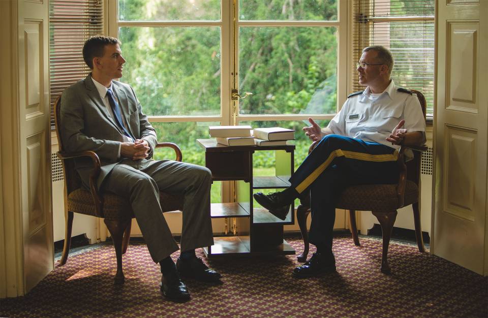 Jared Wigton, a Princeton graduate student in history on leave from the U.S. Army, chats with Lt. Col. Kevin McKiernan, director of the Army Officer Education Program in the Princeton Army ROTC program