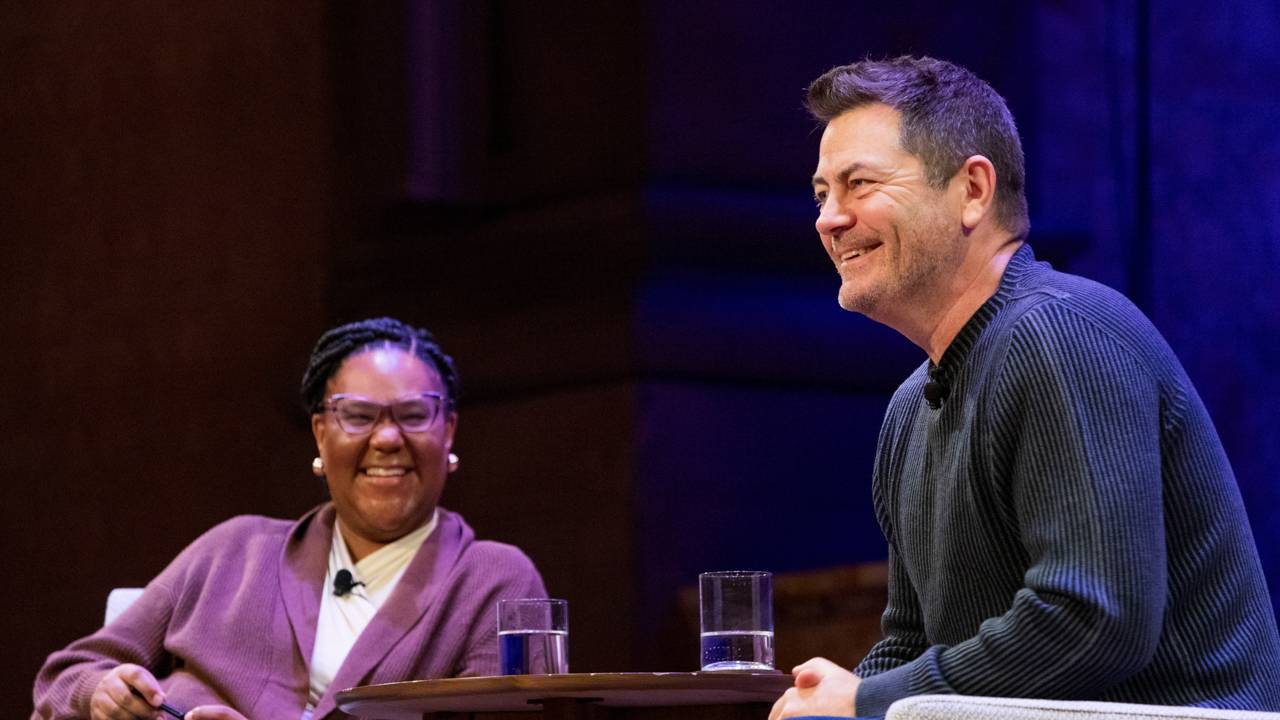 Emmy-award winning actor, comedian, writer and producer Nick Offerman (right) shares a laugh with Mell Thompson (left), associate dean of undergraduate students, during the "Beyond the Resume" conversation in Richardson Auditorium on Jan. 26.