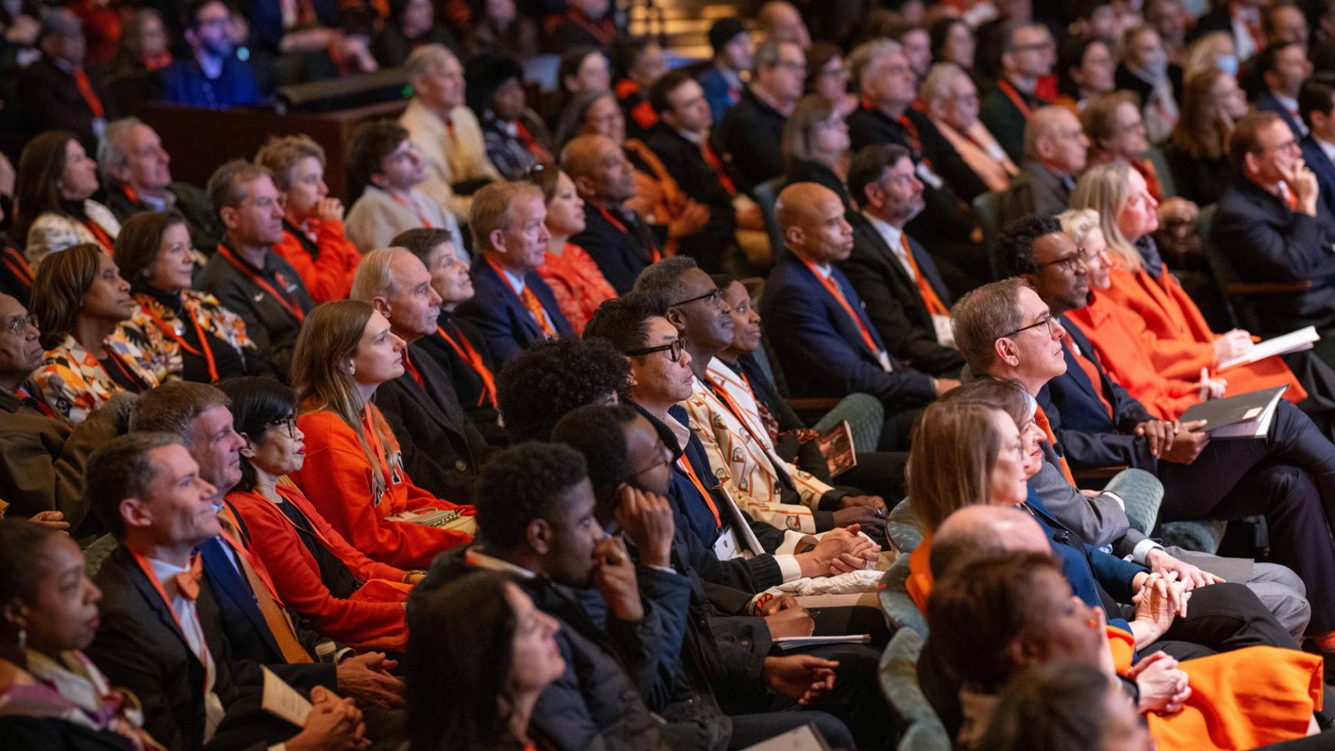 A large number of seated people