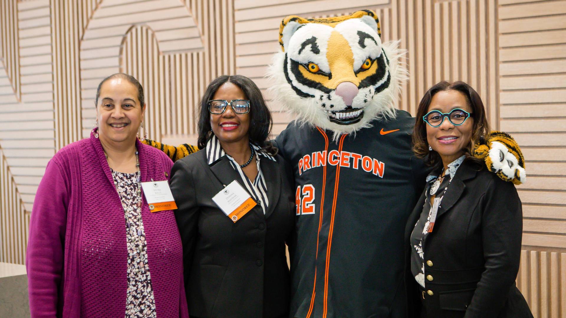 Princeton tiger mascot poses with staff