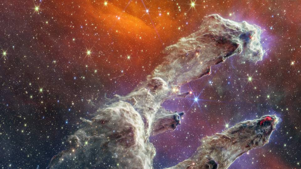 Clouds of dust and gas, as seen through NASA’s James Webb Space Telescope