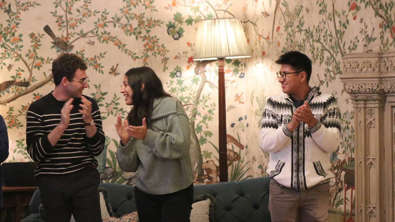 Group of students clapping