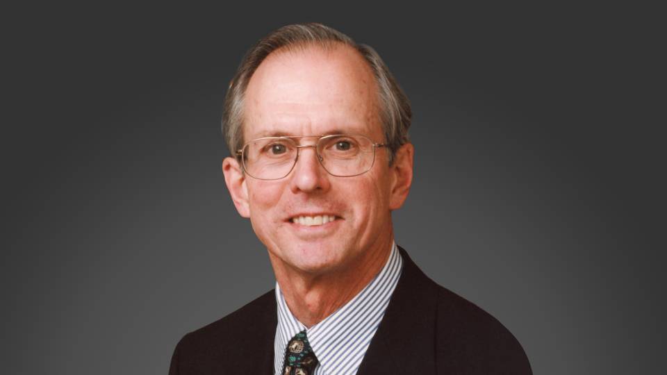 William Russel smiling