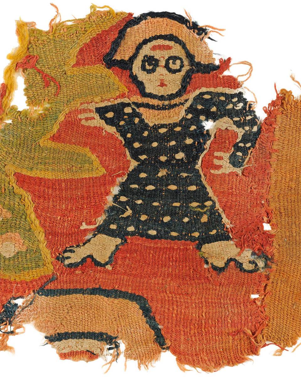 Red fabric with an illustration of a person